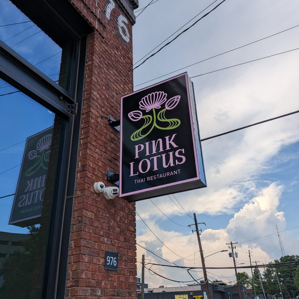 Pink Lotus Thai Restaurant - Outside. Storefront sign at corner of Brady and 10th. - Thai Near Me - Atlanta, Georgia Pink Lotus Thai Restaurant - Outside. Storefront sign at corner of Brady and 10th. - Thai Near Me - Atlanta, Georgia