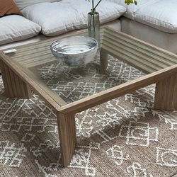 Terra Nova Designs - Large square coffee table with glass top.