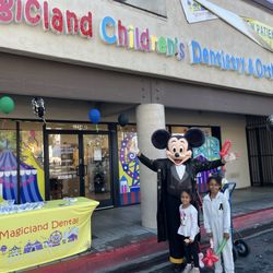 Mickey Mouse was at the dentist with balloons and toothbrushes
