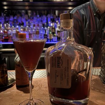 The Office - Manhattan bottle aged with a pear inside - American Near Me - Chicago, Illinois The Office - Manhattan bottle aged with a pear inside - American Near Me - Chicago, Illinois