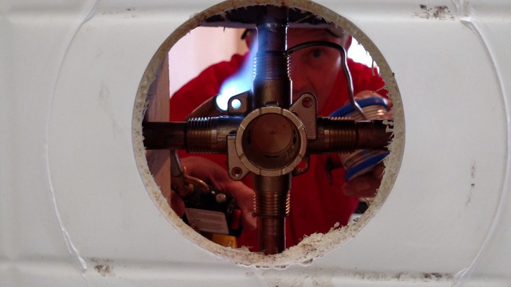 Slide of Compass Plumbing & Drain Services