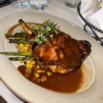 South City Kitchen Midtown - Grilled pork chops - Southern Near Me - Atlanta, Georgia South City Kitchen Midtown - Grilled pork chops - Southern Near Me - Atlanta, Georgia