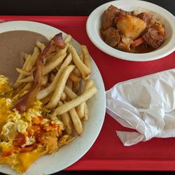 Henry's Mexican Restaurant - Migas and a side of carne guisada.