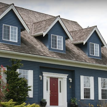 Handy Services - a blue house with a red door - General Contractors Near Me - Millsboro, Delaware Handy Services - a blue house with a red door - General Contractors Near Me - Millsboro, Delaware