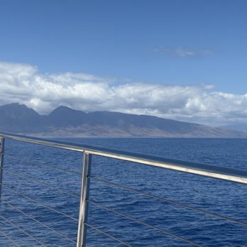 Trilogy Excursions - Beautiful Hawaiian island with fluffy clouds and the bluest water. - Snorkeling Near Me - Lahaina, Hawaii Trilogy Excursions - Beautiful Hawaiian island with fluffy clouds and the bluest water. - Snorkeling Near Me - Lahaina, Hawaii