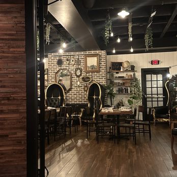 Curiouser Coffee & Conservatory - Coffee & Tea Near Me - Apple Valley, Minnesota