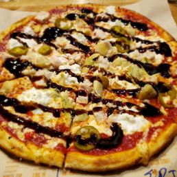 "Art Lovers"  artichoke, mozzarella, ricotta, chopped garlic, red sauce. EXTRAS: Chicken, Parmesan, hot peppers, and a balsamic drizzle.
