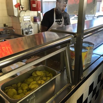Max's Steaks - He on the grill getting it - Sandwiches Near Me - Philadelphia, Pennsylvania