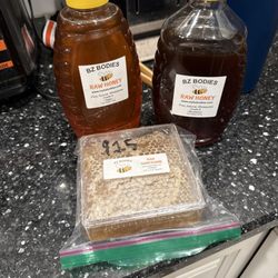 BZ Bodies - Bottles of honey and honeycomb
