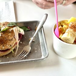 Retro Eighth Coffee & Acai - A portion of our breakfast: Unbeetable breakfast sandwich on left and yummy açaí bowl on the right.