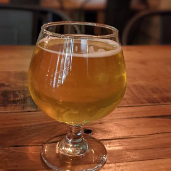 Piñon Bottle - a glass of beer on a wooden table - Beer Bar Near Me - Reno, Nevada Piñon Bottle - a glass of beer on a wooden table - Beer Bar Near Me - Reno, Nevada