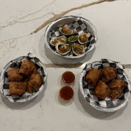 The Bottom of the Bayou Oysters and Crawfish Egg Rolls