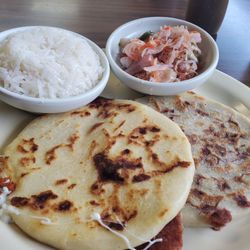 Catrachos Restaurant - 1 Cheese, 1 Bean/Cheese Pupusa = $3.28ea. No longer offer Spanish Rice only white rice @ $3.02