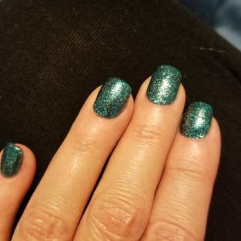 Nails & Tan - P20 Gel polish. Looks like a sparkly mermaid aquamarine. Beautiful! - Tanning Near Me - Garner, North Carolina Nails & Tan - P20 Gel polish. Looks like a sparkly mermaid aquamarine. Beautiful! - Tanning Near Me - Garner, North Carolina