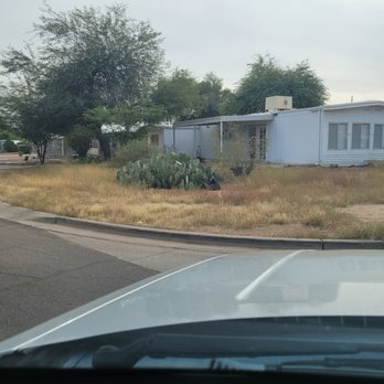 Market Edge Realty - Enjoy the dry weeds in their lovely run-down trailer - Real Estate Agents Near Me - Phoenix, Arizona