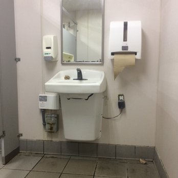 7-Eleven - a public restroom with a sink, mirror and toilet paper dispenser - Convenience Stores Near Me - Sanford, Florida 7-Eleven - a public restroom with a sink, mirror and toilet paper dispenser - Convenience Stores Near Me - Sanford, Florida