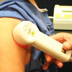 Binder Chiropractic - Cold Laser treatment on your shoulder