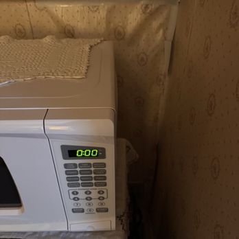 Redstone Inn - In room microwave covering wallpaper damage - Hotels Near Me - Dubuque, Iowa Redstone Inn - In room microwave covering wallpaper damage - Hotels Near Me - Dubuque, Iowa