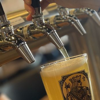 Tecumseh Tavern - a beer being poured from a tap - Salad Near Me - Tecumseh, Michigan
