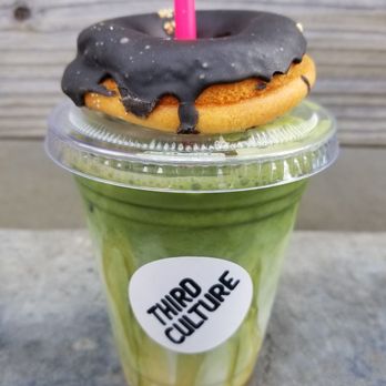 Third Culture Bakery - Berkeley - Black sesame mochi donut on Matcha Latte. - Bakeries Near Me - Berkeley, California Third Culture Bakery - Berkeley - Black sesame mochi donut on Matcha Latte. - Bakeries Near Me - Berkeley, California