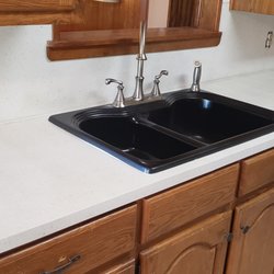 Sterling Refinishing - Added a whole new look to this older kitchen.