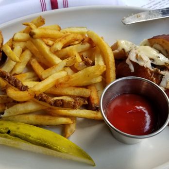 Culinary Dropout - Half of the turkey pastrami sandwich $13 (4/5). Wasn't too hungry so splitting it was fine, but not as big as other burgers I saw - New American Near Me - Austin, Texas