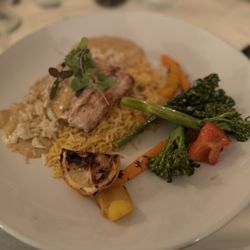 Channel Bass Inn - Tough, leathery and overcooked mahi mahi in a broken crab cream sauce?). Side of partly-cooked butter veggies. Saffron rice.