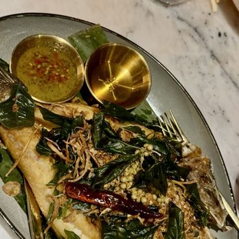 Sukh - Pla Tod Samun Prai - Fried filet Branzino topped with crispy Thai herb - Thai Near Me - Brooklyn, New York
