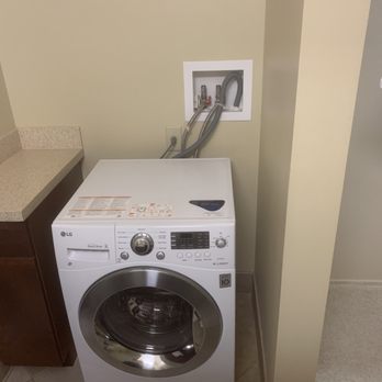 MacDill Inn - Washer in bathroom - Hotels Near Me - MacDill AFB, Florida