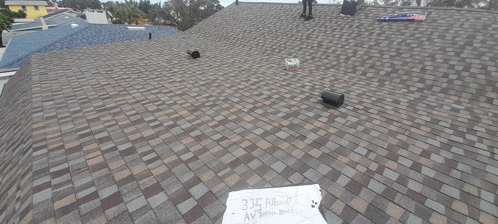 Slide of Amen Roofing Group