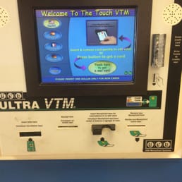 Card machine. Bring $1 cash for the card, then cash to load the card.  No more quarters!