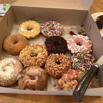 Beignets - a box of doughnuts on a table - Donuts Near Me - Denville, New Jersey Beignets - a box of doughnuts on a table - Donuts Near Me - Denville, New Jersey