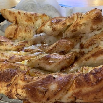 Round Table Pizza - Wonderful Garlic Parmesan Twists - Pizza Near Me - Santa Ana, California Round Table Pizza - Wonderful Garlic Parmesan Twists - Pizza Near Me - Santa Ana, California