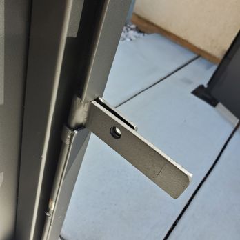 By Design Ornamentals - 3/8" hole will accommodate just about any type of padlock.  You don't get this extra feature on a standard gate from some random company. - Fences & Gates Near Me