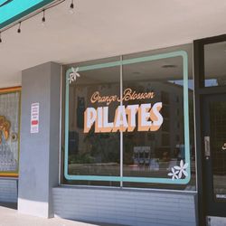 The entrance to our space, featuring hand painted windows by a local artist.