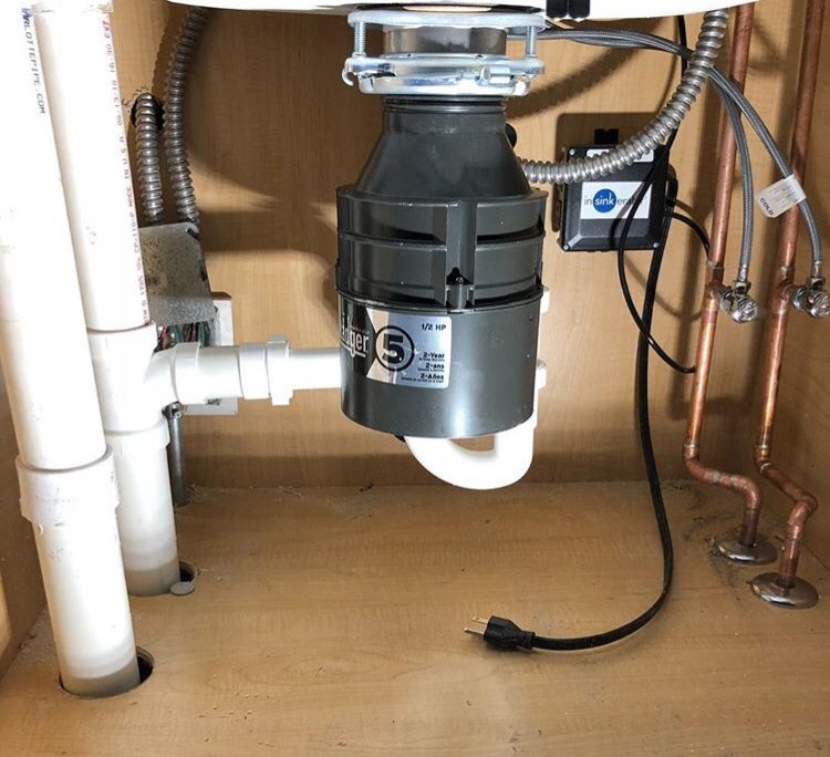 Slide of EW Tompkins Plumbing Heating Cooling