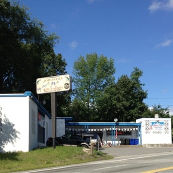 Johnston Fine Wine Beer & Spirits - a white building with a blue roof - Beer, Wine & Spirits Near Me - Johnston, Rhode Island Johnston Fine Wine Beer & Spirits - a white building with a blue roof - Beer, Wine & Spirits Near Me - Johnston, Rhode Island