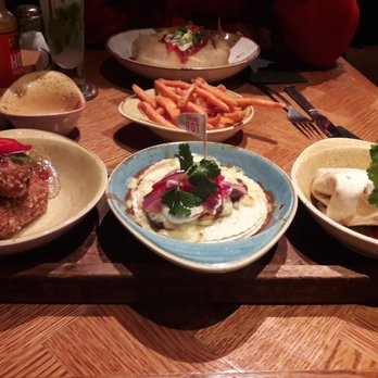 Chiquito- Crawley - Street food (left to right): chorizo & sweet potato croquettes, beef chilli tortilla stack, mini chicken burrito. - Mexican Near Me - Crawley, WSX