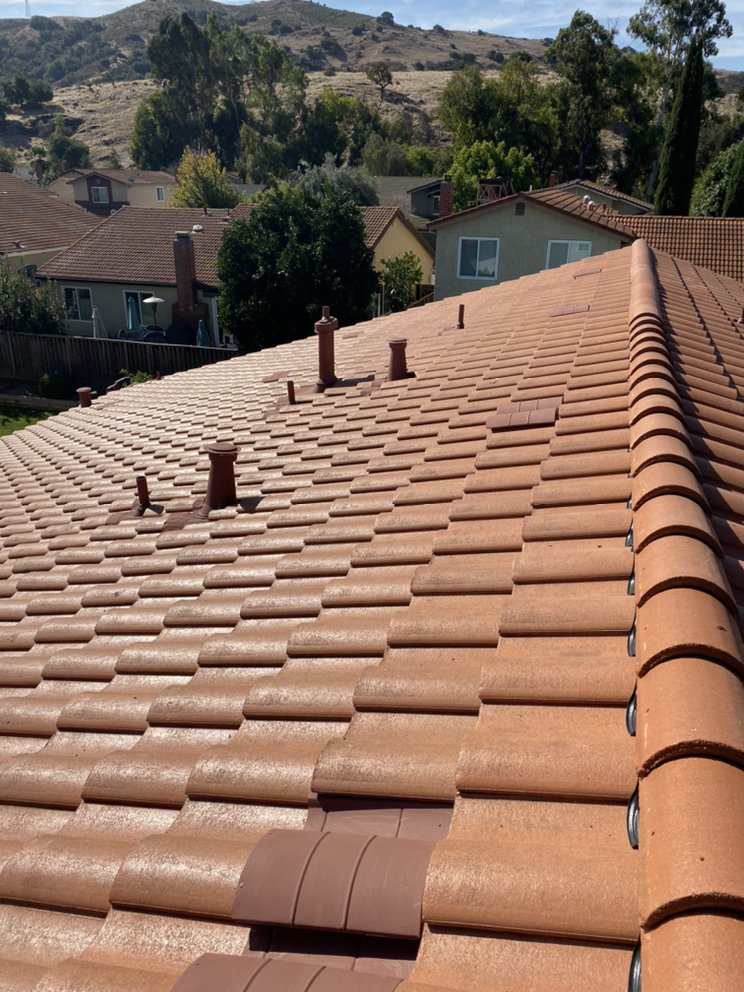 Slide of RECO Roofing