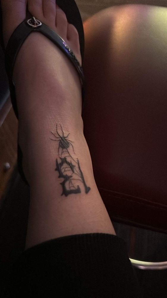 Permanent Impressions Ink Tattoo Studio Logo