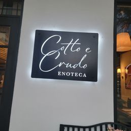 Exterior outside entrance of Cotto E Crudo Enoteca - Houston, Texas Exterior outside entrance of Cotto E Crudo Enoteca - Houston, Texas