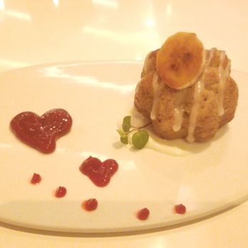 Stripsteak - Banana bread with heart shapped raspberry coulis. Light and moist puff that's well balanced with the raspberry. - Steakhouses Near Me - Honolulu, Hawaii Stripsteak - Banana bread with heart shapped raspberry coulis. Light and moist puff that's well balanced with the raspberry. - Steakhouses Near Me - Honolulu, Hawaii