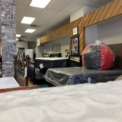 Shallow the Bed Store - Multiple beds, nightstands, and bean bags for sale.