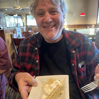 Perkins American Food - Bill with his Coconut Cream Pie, slice - Bakeries Near Me - Bartow, Florida Perkins American Food - Bill with his Coconut Cream Pie, slice - Bakeries Near Me - Bartow, Florida