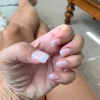 Passion Nail Spa II - After 24 hours and going back for a "fix" this is what I came out with.  Supposed to be square with round edges. - Nail Salons Near Me - Clarksburg, Maryland