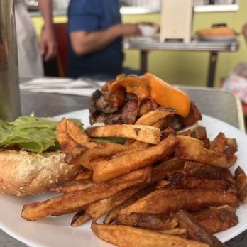 White Star Diner - a plate of french fries and a burger - Burgers Near Me - Winnipeg, Manitoba White Star Diner - a plate of french fries and a burger - Burgers Near Me - Winnipeg, Manitoba