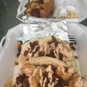 Shark Bite - Shrimp and Chorizo Tacos (Surf Dog in the background) - Food Trucks Near Me - Navarre, Florida