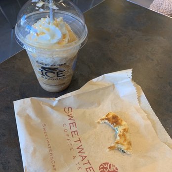Sweetwaters Coffee & Tea - Caramel Ice Dragon w/ a feta cheese croissant that I nearly finished - Coffee & Tea Near Me - Smithtown, New York Sweetwaters Coffee & Tea - Caramel Ice Dragon w/ a feta cheese croissant that I nearly finished - Coffee & Tea Near Me - Smithtown, New York