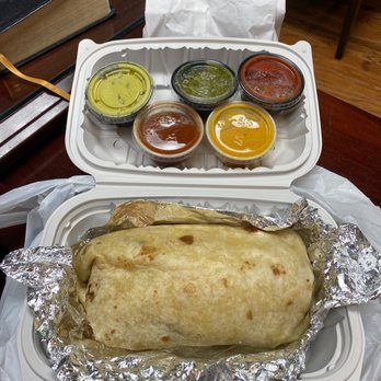 Nacho Taco - Vegan Chicken Cali Burrito with some sauce samples - Food Stands Near Me - Jacksonville, Florida Nacho Taco - Vegan Chicken Cali Burrito with some sauce samples - Food Stands Near Me - Jacksonville, Florida