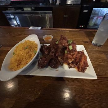 Curry n Jerk - Jerk wings and rice - Caribbean Near Me - Memphis, Tennessee